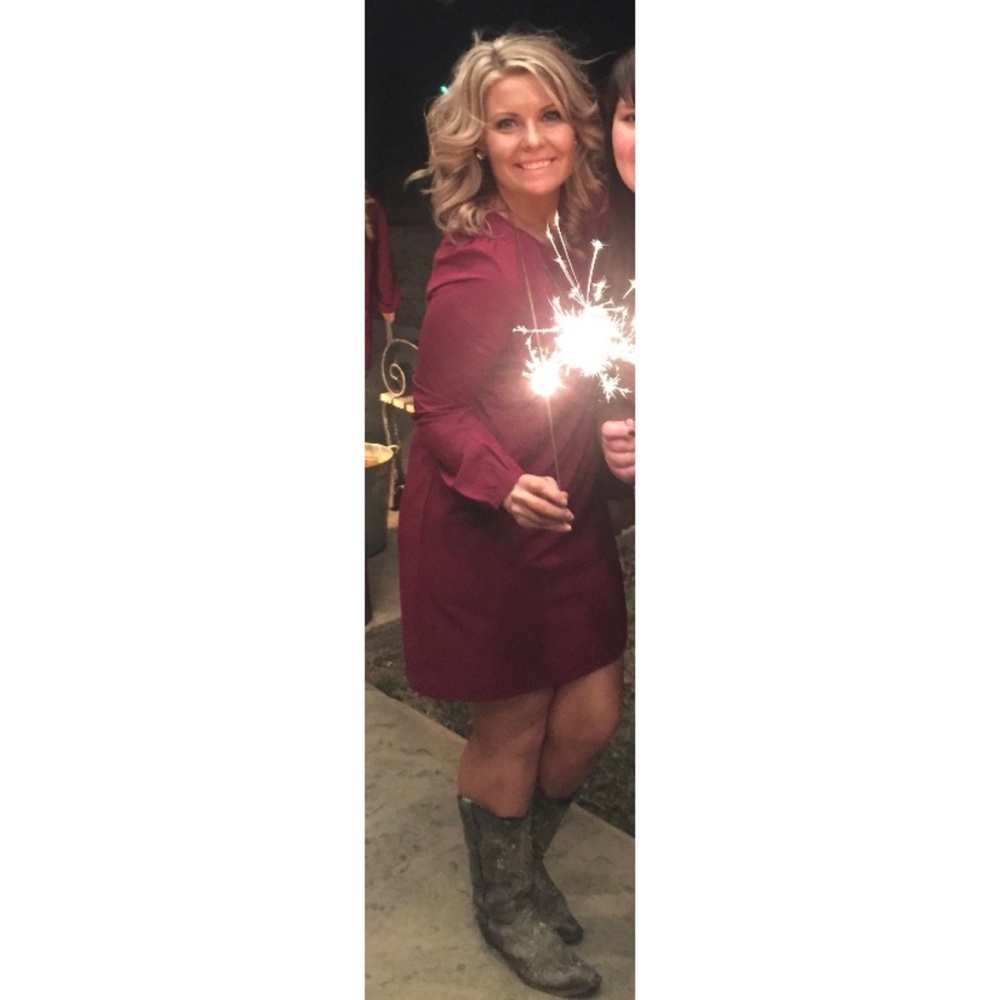 Long sleeve, burgundy shift dress.